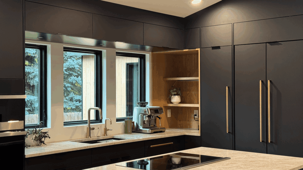 soft touch panels, european style kitchen, custom kitchen, custom cabinets, inset cabinets, flat panel cabinets, dark kitchen, black cabinetry, dark toned kitchen, tall cabinets, integrated appliances, panel ready appliances, built in shelves, natural wood