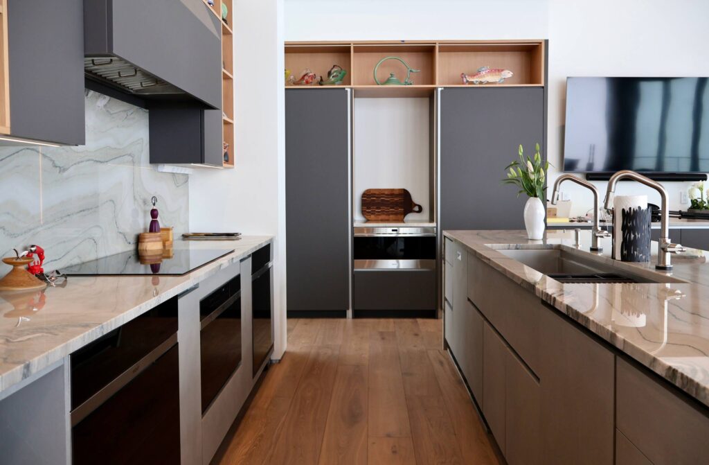 matte European cabinetry, kitchen, gloss, frameless cabinets, modern kitchen, European cabinetry with matte finish, frameless gloss kitchen cabinets, luxury European kitchen design, matte vs gloss cabinet finishes, modern kitchen, flat panel frameless design, open shelving, soft touch panels, fenix panels, kitchen island, custom cabinets, custom cabinetry for kitchen, hidden appliances, panel ready appliances, integrated appliances