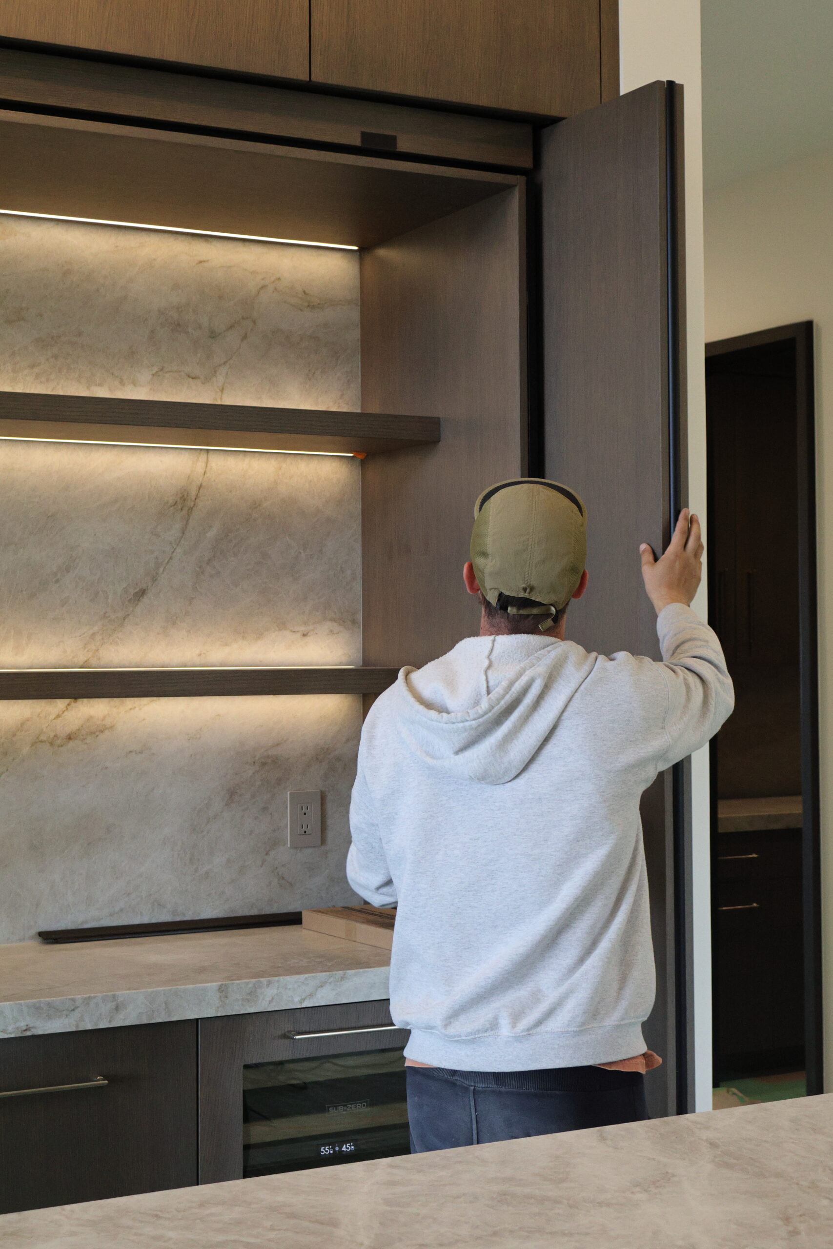 full service custom cabinetry, pocket door systems in european cabinetry hidden pantry pocket door system utah european cabinetry with concealed storage modern home bar pocket door cabinets custom cabinetry pocket system detail concealed coffee station european cabinets
